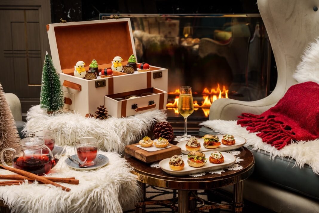 a cluttered yet cozy home desk bathed in soft morning sunlight, an open productivity planner with handwritten habit trackers,